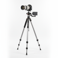 Premium aluminum camera tripod fully extended on white background